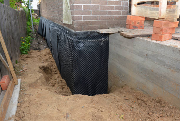Happy homeowners after waterproofing job in Lanoka Harbor